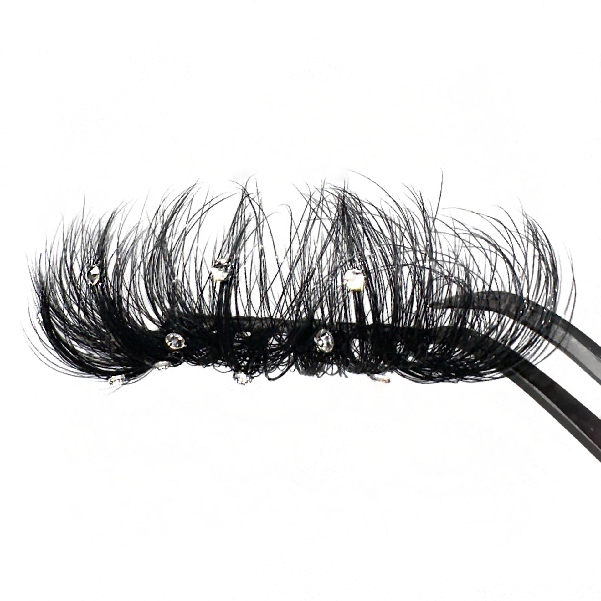 Mink Silver Rhinestone Lashes. 3D 25mm Mink Lashes With Small Reflective Rhinestones Scattered Throughout The Lashes. Long Fluffy Eyelashes. Black Eyelashes With Rhinestones On Them.