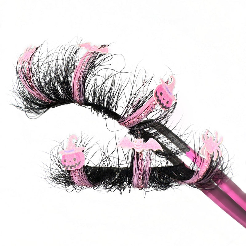 3D Luxury Mink Halloween Lash Extensions. Pink Glitter Color Lashes. Pink Lashes With Spider, Bat, And Pumpkin Decals. 25mm Eyelashes With Fluffy Wispy Volume. Eyelashes For Halloween.